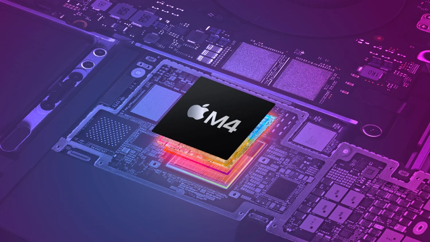 Close-up image of a laptop motherboard showing various chips and components