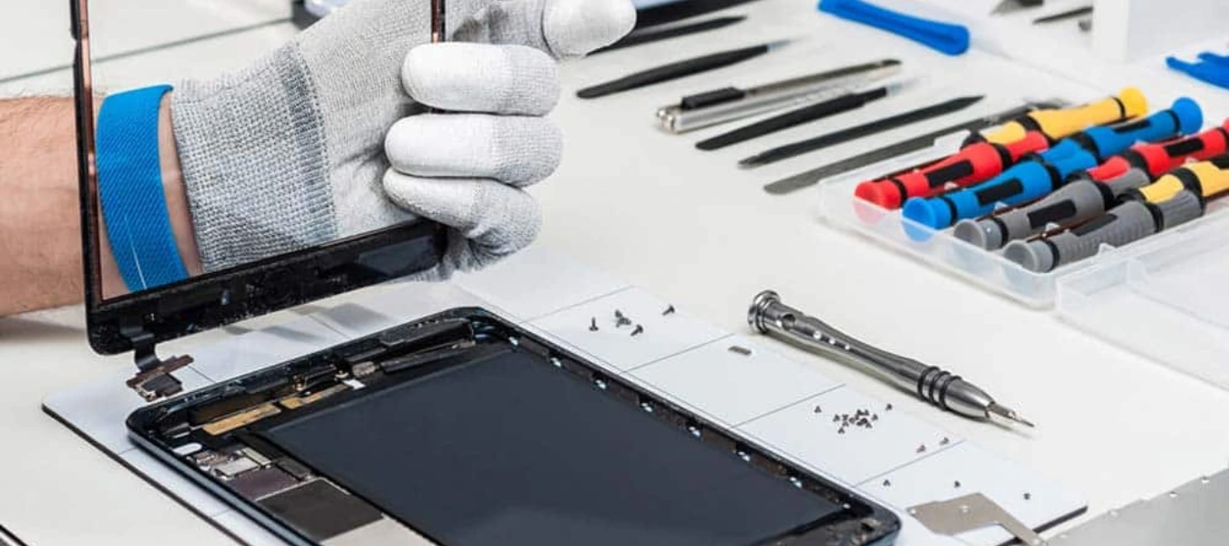 Illustration of a technician repairing a smartphone with tools
